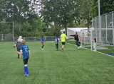 Laatste training S.K.N.W.K. JO10-1 (partijtje tegen de ouders) van woensdag 22 mei 2024 (104/133)